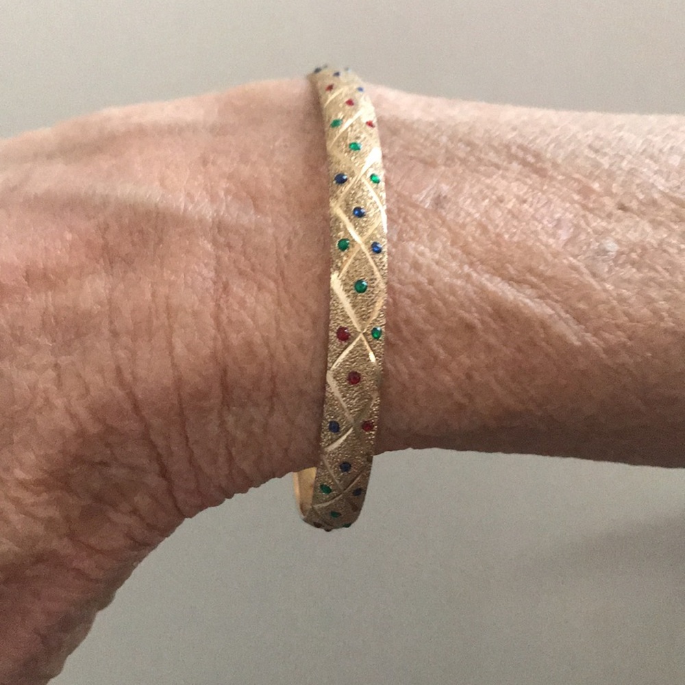 10 karat gold textured bangle with tiny stones
